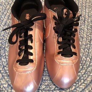 Ladies rose gold Nike sneakers